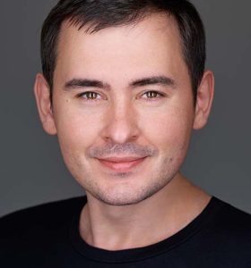 Максим Николаев